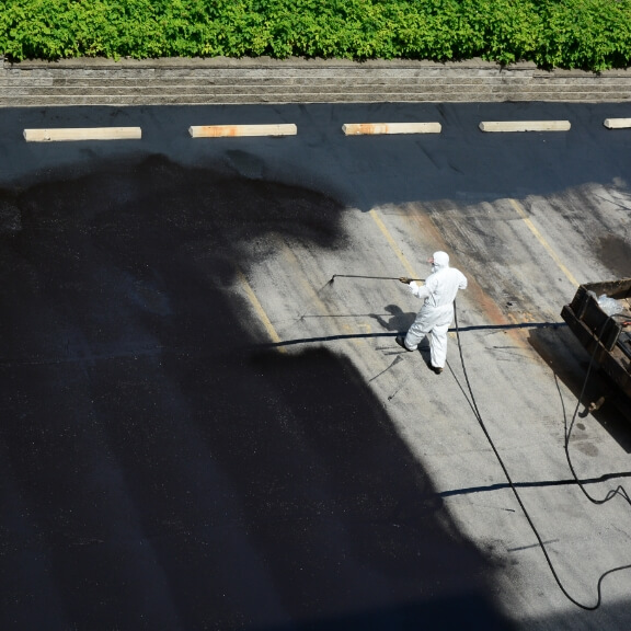 A member of our team preparing a parking lot.